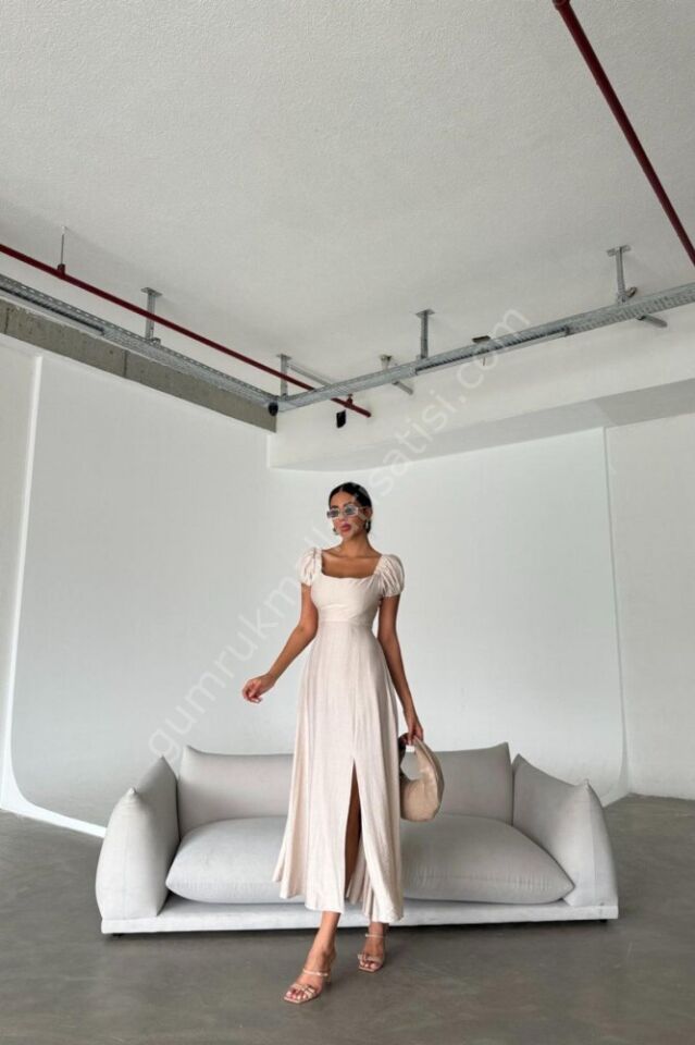 Yandan Fermuarlı Yırtmaçlı Ferma Krem Elbise